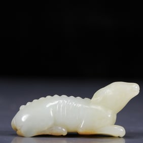 An Exquisite White Jade Dog Ornament