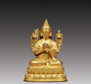 A Solemn Gilt Bronze Statue of Guru