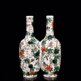 An Exquisite Famille-Rose Melon and Fruit Pattern Conjoined bottles