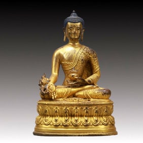 A Solemn Gilt Bronze Statue of Sakyamuni