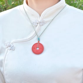 An Exquisite Cinnabar Pendant