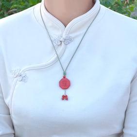 An Exquisite Cinnabar Pendant