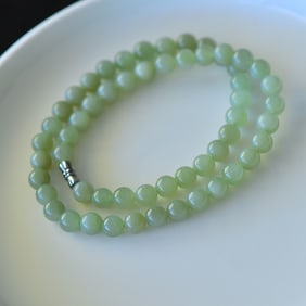 An Exquisite Sterling Silver Inlaid Greenish Jade Necklace