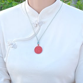 An Exquisite Cinnabar Fu-Character Pattern Pendant