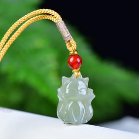 An Exquisite White Jade Fox Pendant
