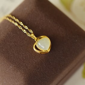 An Exquisite Sterling Silver-Gold Plated Inlaid White Jade Necklace