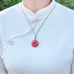 An Exquisite Cinnabar Pendant