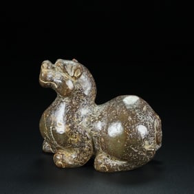 An Exquisite White Jade Auspicious Beast Ornament