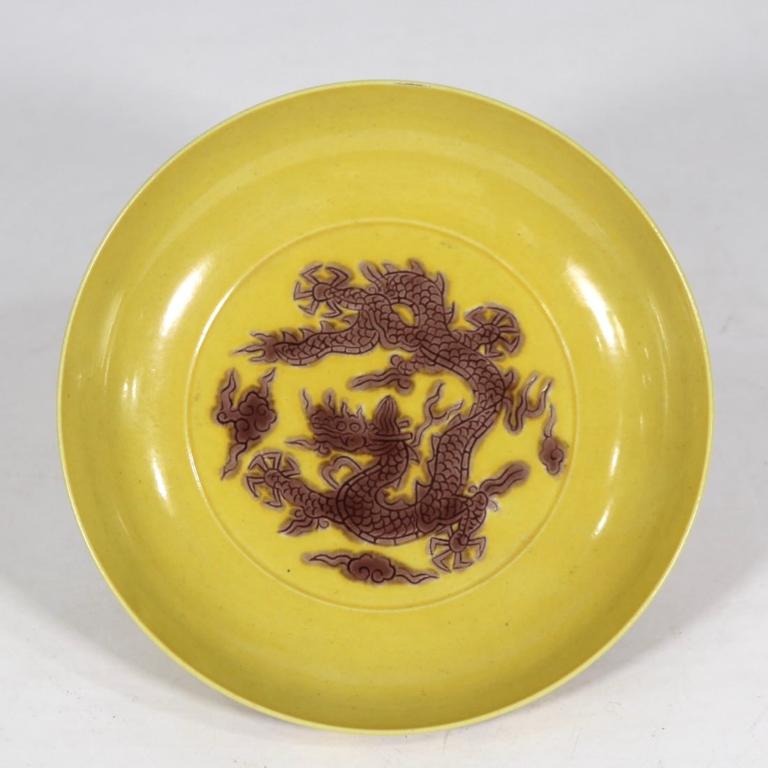 An Exquisite Underglaze-Red Dragon Pattern Plate: An Exquisite Underglaze-Red Dragon Pattern Plate Ming Dynasty, China Zhengde Four-character Mark Size:5.8in釉里红刻龙纹盘 中国明代 