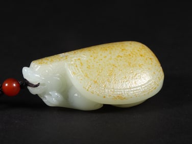 An Exquisite White Jade Auspicious Beast Pendant