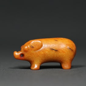 An Exquisite White Jade Pig Pendant