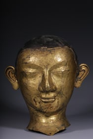 An Exquisite Gilt Bronze Buddha head