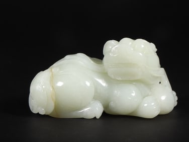 An Exquisite White Jade Lion Ornament