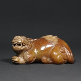An Exquisite White Jade Auspicious Beast Ornament