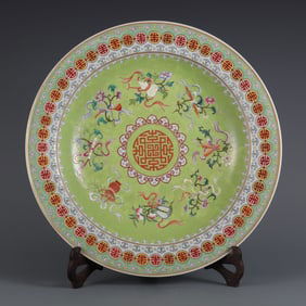 An Exquisite Famille-Rose Green Ground Eight Treasures Pattern Plate