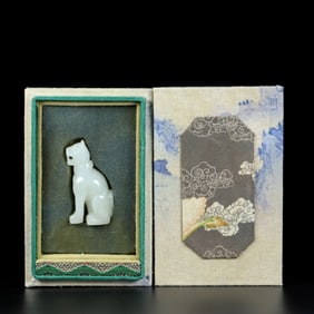 An Exquisite White Jade Dog Ornament