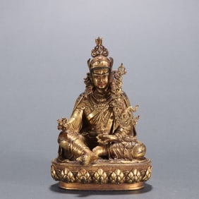 An Exquisite Gilt Bronze Statue of Padma Sambhava
