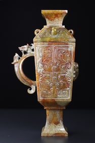 An Exquisite White Jade Beast-Face Pattern Cup