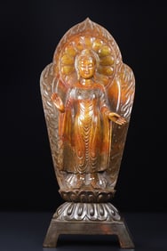 An Exquisite White Jade Buddha Statue