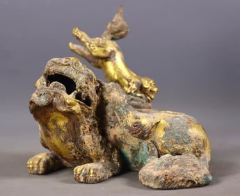 An Exquisite Gilt Bronze Lion Ornament