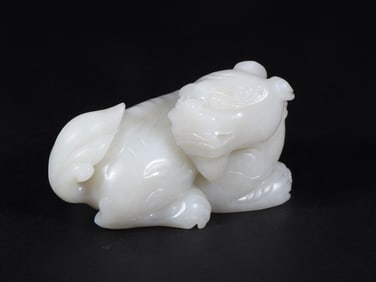 An Exquisite White Jade Lion Ornament