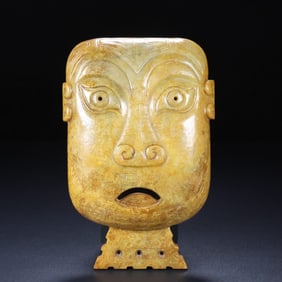 An Exquisite White Jade Mask