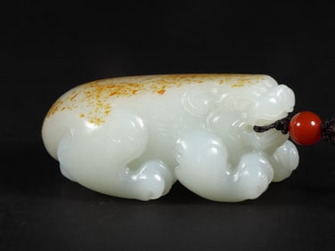 An Exquisite White Jade Auspicious Beast Pendant