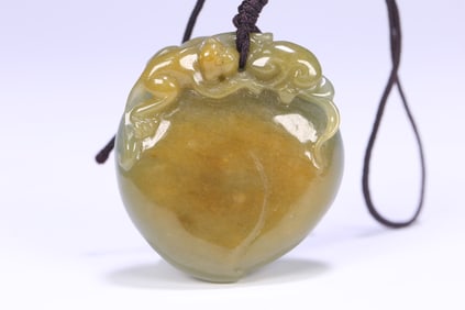 An Exquisite Jadeite Monkey Pattern Pendant