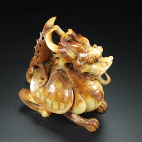 An Exquisite White Jade Auspicious Beast Ornament