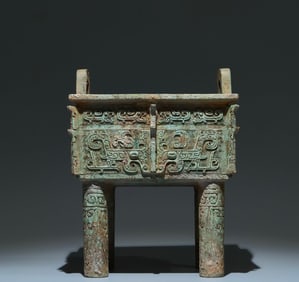 An Archaic Bronze Beast-Face Pattern Double-Ears Four Legs Food Vessel