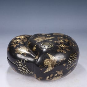 An Exquisite Black Lacquer Painted Gold Shou-Character Flower and Bird Pattern Peach-Shaped Cover