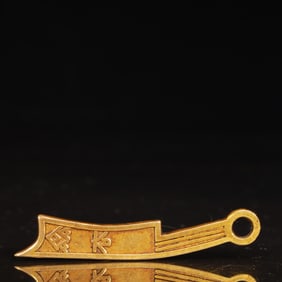 An Exquisite Gilt Bronze Sword Coin