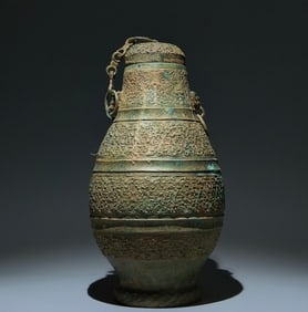 An Archaic Bronze Feather Pattern Beast-Ears Pot