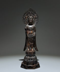 A Solemn Bronze Buddha Statue