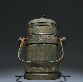 An Archaic Bronze Feather Pattern Ewer,With Inscription