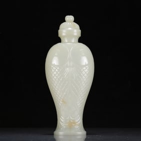 An exquisite white jade fish-pattern bottle