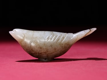 An Exquisite White Jade Bird Pommel