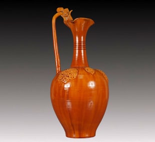 A Rare Tang Tri-Color Glazed Pottery Flower Pattern Dragon-Handle Ewer