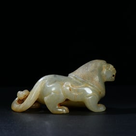 An Exquisite White Jade Lion Ornament