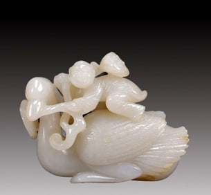 An Exquisite White Jade Figure and Goose Ornament