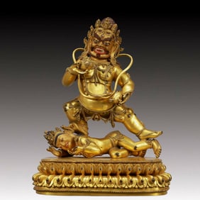 A Solemn Gilt Bronze Statue of Mammon