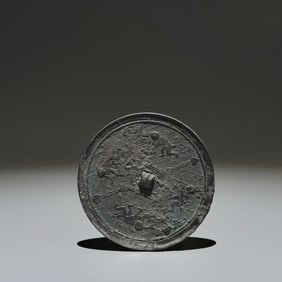 An Archaic Bronze Monkey Pattern Round Mirror