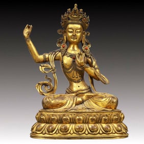 A Solemn Gilt Bronze Statue of Tara, Inlaid Gems