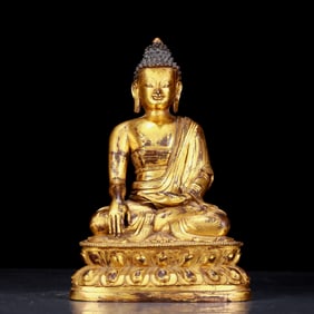 An exquisite gilt bronze statue of Sakyamuni