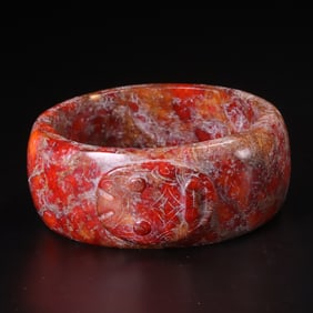 An Archaic Red Jade Bracelet