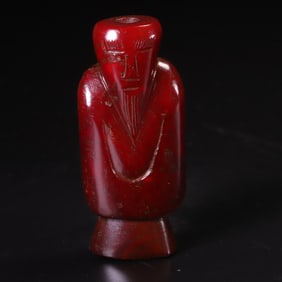 An Archaic Red Jade Figure Ornament