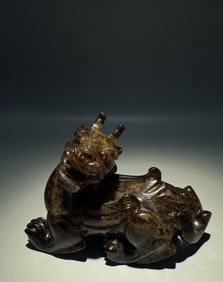 A Rare Gaogu Jade Auspicious Beast Ornament