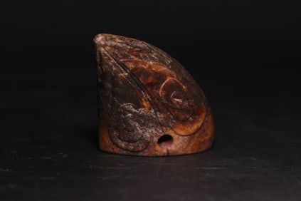 An Archaic Gaogu Jade Terminal Ornament