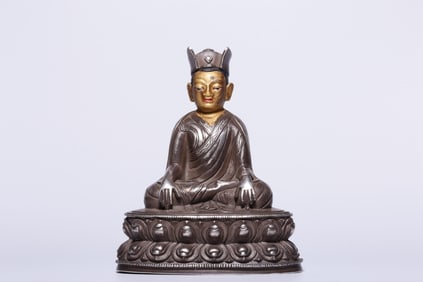 A Rare Gilt Silver Statue of Karma Pakshi Seated