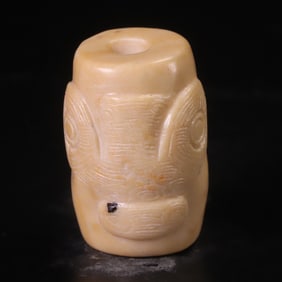 An Archaic Gaogu Jade Lezi